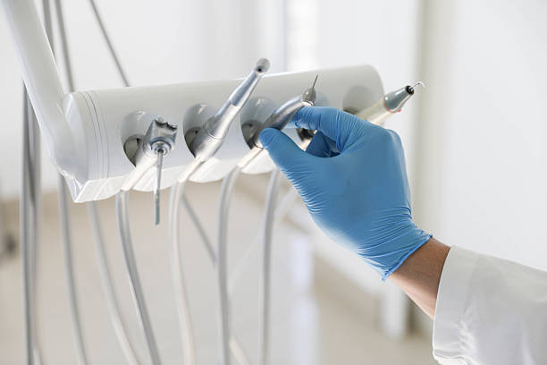 Professional Emergency Dentist technician working in Dinuba, CA
